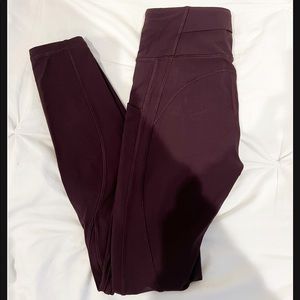 Lululemon wonder train leggings in the color wine size 2
